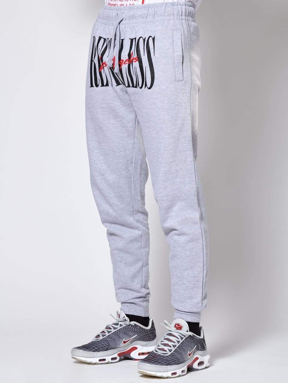 Young and reckless sweatpants top